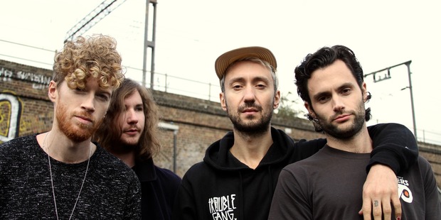 Simon Oscroft (far left) has formed a band with Gossip Girl star Penn Badgely (far right).