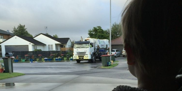 As soon as Alex Brown hears the rubbish truck he runs to the door, says his dad. Photo / Getty Images