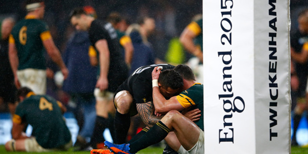 Jesse Kriel of South Africa is consoled by Sonny Bill Williams following their loss to the All Blacks at the Rugby World Cup. Photo / Getty.