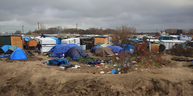 One Kiwi volunteer described the atmosphere of the Calais migrant camp known as the "jungle" as desolate and sombre. Photo / AP