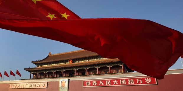 China is expected to raise the issue of visa extensions and OIO processing times during John Key's visit to the capital. Photo / Bloomberg