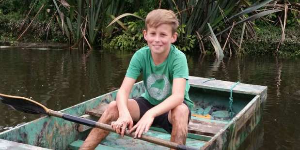 Sandy Muir of Waiuku enjoys a Tom Sawyer-type adventure on the Waikato Delta.