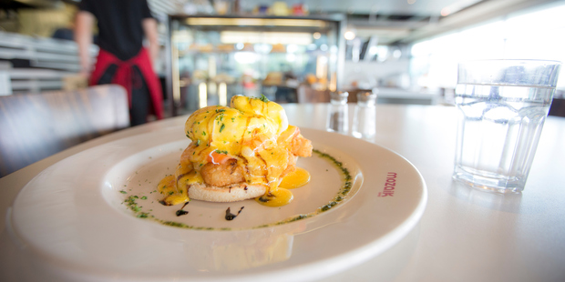 Eggs benedict with salmon at Mozaik cafe. Photo / Michael Craig
