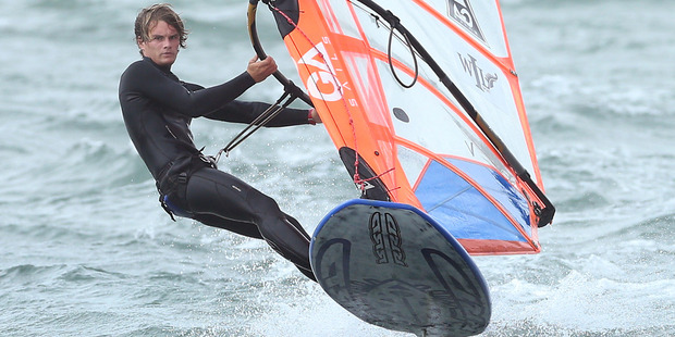 Alex Hart, here on Tauranga Harbour, will endure 24 hours of laps up and down Mauao to raise funds for Olympic windsurfer Natalia Kosinska.