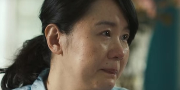 A young woman cries as her mother says she's a "leftover women" because she's not pretty. Image / SK-II