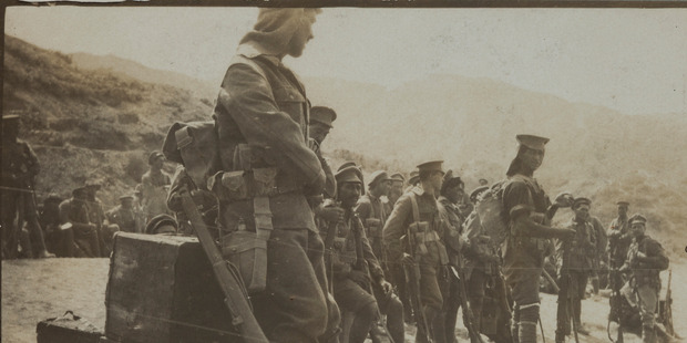 Members of the Maori Contingent gathering on the beach at Gallipoli. Photo / courtesy of Auckland War Memorial Museum - Tamaki Paenga Hira. Williams Album (1915), PH-ALB-212-15-2