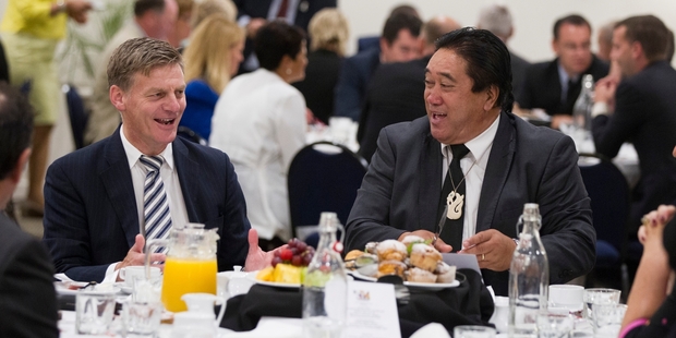 Sonny (Raniera) Tau, seen here on official duty sharing Waitangi Day breakfast with Deputy Prime Minister Bill English last year, is on extended board-approved leave from his position as chairman of the Ngapuhi Runanga. Photo / John Stone