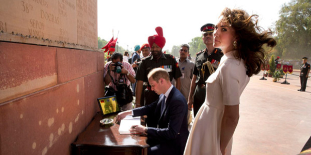Kate battles the wind. Picture: Manish Swarup/AFP/Getty Images