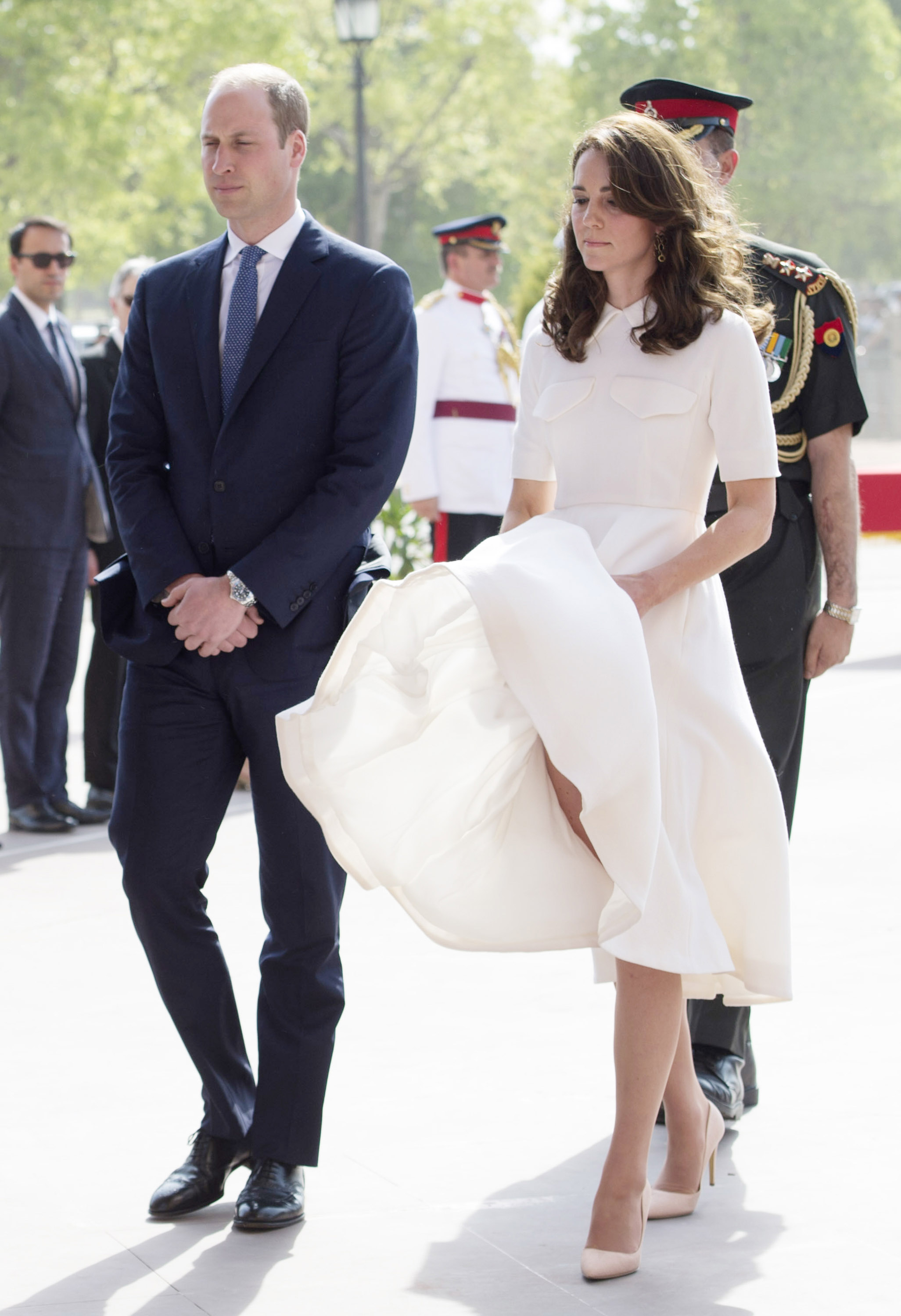 The out of control dress threatened to upstage the sombre occasion. Picture: Getty Images