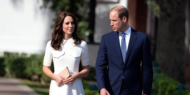 The young royals removed their shoes as a mark of respect at the Gandhi Smiriti museum in India. Photo / Getty