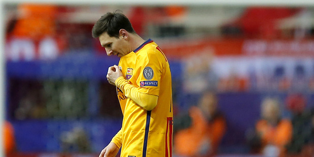 Lionel Messi and Barcelona crashed out of the Champions League yesterday. Photo / AP