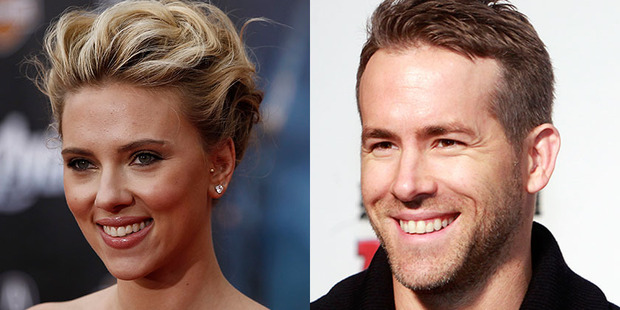 Scarlett Johansson and ex-husband Ryan Reynolds. Photos / AP