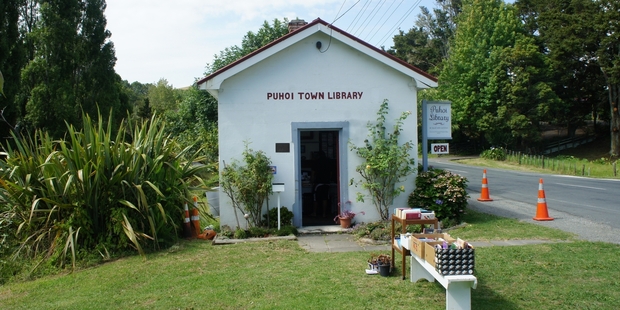 More than 6000 tourists visit the tiny Puhoi Library each year.