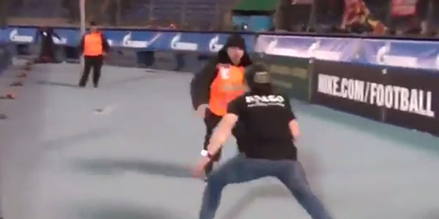 A Russian football fan has captured the imagination of the internet with this athletic escape from eight security guards at a recent Spartak Moscow match. Photo / YouTube.