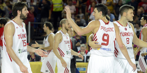 Basketball players of Turkish National Basketball Team celebrate their victory. Photo / Getty Images