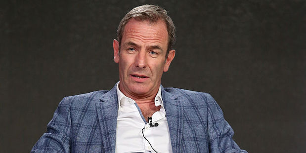 The vicar's Filipino wife of 16 years left him for Robson Green. Photo / Getty Images
