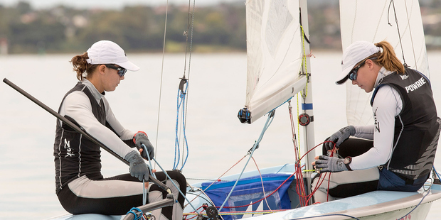 Jo Aleh and Polly Powrie practice sailing in their 470 on the Waitemata Harbour. Photo / Getty Images