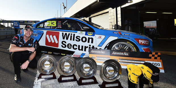 Race winner Scott McLaughlin is pictured with his trophies at the V8 Supercars Phillip Island. Photo / Getty Images