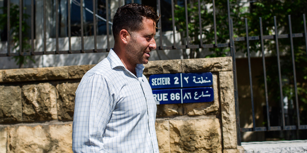 Father Ali Elamine leaves court. Photo / Getty Images