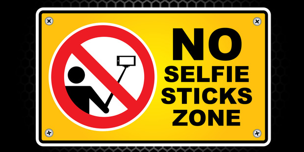 The telescopic sticks used to take self-photos are on the list of prohibited items at this year's service at Anzac Cove in Turkey. Photo / iStock