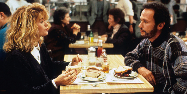 Meg Ryan and Billy Crystal in the, ah, climatic scene of the hit rom-com film When Harry Met Sally.
