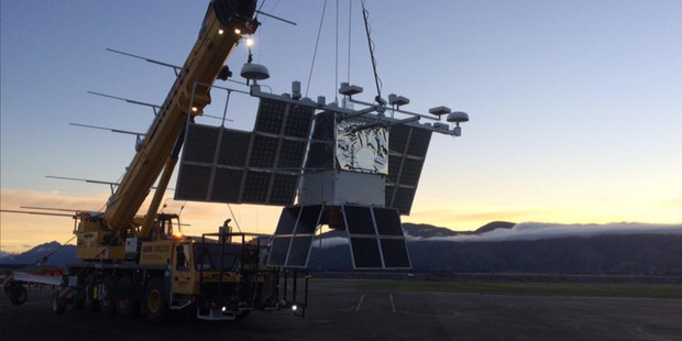 A crane takes Nasa's weather balloon back to the hangar at Wanaka Aerodrome earlier this month after the launch was postponed due to inclement weather. Photo/ Facebook/Nasa