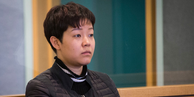Yixin Gan in the High Court yesterday. The Crown alleges she used her food-shipping business as a front for importing the precursor drugs. Photo / Jason Oxenham