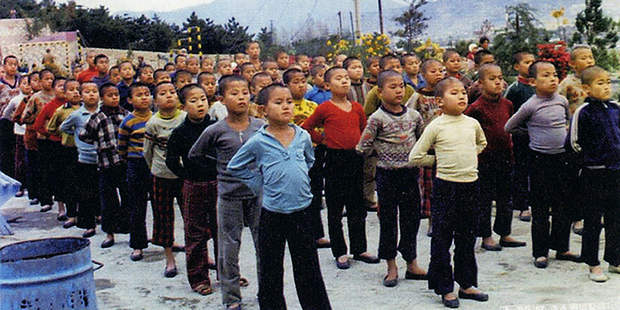 In this undated image, child inmates line up for morning assembly at the Brothers Home in Busan, South Korea. Photo / AP