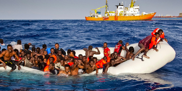 More refugees coming from North Africa - such as these off the coast of the Italian island of Lampedusa - are expected on Europe's southern shores in coming months. Photo / AP