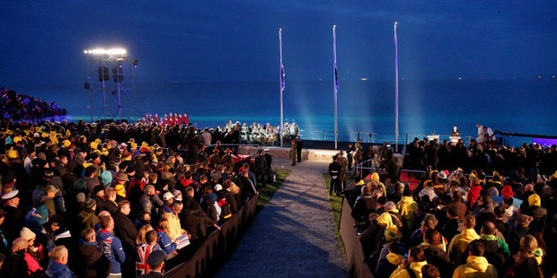People observe a minute of silence during the Dawn Service ceremony at the Anzac Cove beach in Gallipoli peninsula, Turkey, early Saturday, April 25, 2015. Photo / AP