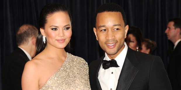 Christine Teigen and John Legend announced their tiny daughter's birth last Thursday on social media. Photo / AP