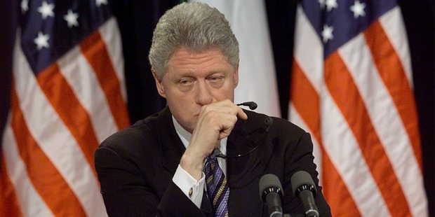 Former US President Bill Clinton pauses a moment while being asked about former White House intern Monica Lewinsky. Photo / Getty Images