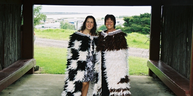Emily Wilburn (left) and Jean Neshausean in korowai Jean made at Matai Whetu Marae in Thames.