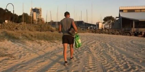 It's hard to storm off in sand while wearing shorty-shorts and holding an eco bag and a picnic blanket, but Jono does.
