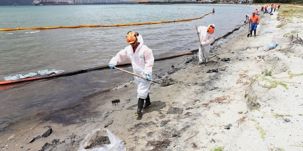 An exercise to clean up a simulated oil spill in Whangarei Harbour - which had about 7000 litres of oil leak from a ship last December (above) - is being held on Wednesday.