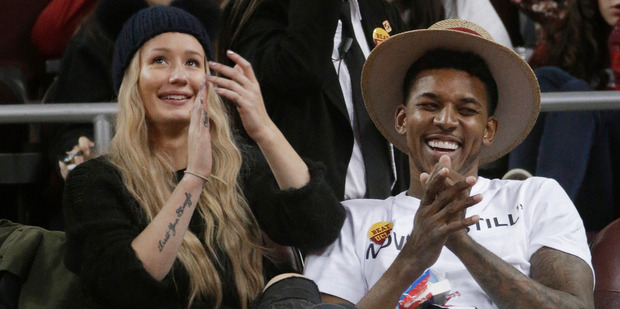 Iggy Azalea, left, with Nick Young. Photo/AP