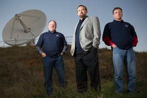 Professor Sergei Gulyaev (centre), director of AUT's Institute of Radio Astronomy and Space Research, stands with colleagues Tim Natusch (left) and Stuart Weston.