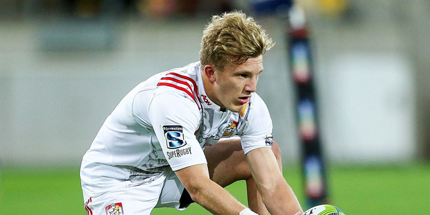Damian McKenzie of the Chiefs lines up a kick. Photo / Getty Images.