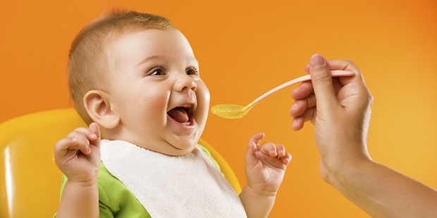 One day your baby will smear yoghurt all over himself and his highchair and then throw it on the floor for the last time. Photo / Getty