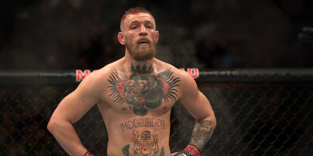 Conor McGregor prepares for the second round to begin while facing Nate Diaz in March. Photo / Getty Images