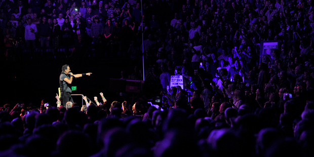 Bruce Springsteen's tribute to Prince is perfect - he walked on stage and played Purple Rain without introduction. Photo / Getty