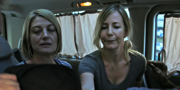 Australian TV journalist Tara Brown, left, and Sally Faulkner, right, the mother of the two Australian children, sit in a minivan after they released from a Lebanese jail. Photo / Supplied