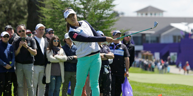 Lydia Ko, of New Zealand, hits from off the first fairway of the Lake Merced Golf Club during the third round of the Swinging Skirts LPGA Classic. Photo / AP.