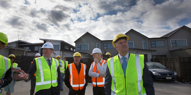 Prime Minister John Key during his visit to Hobsonville Point housing development. Photo / Brett Phibbs