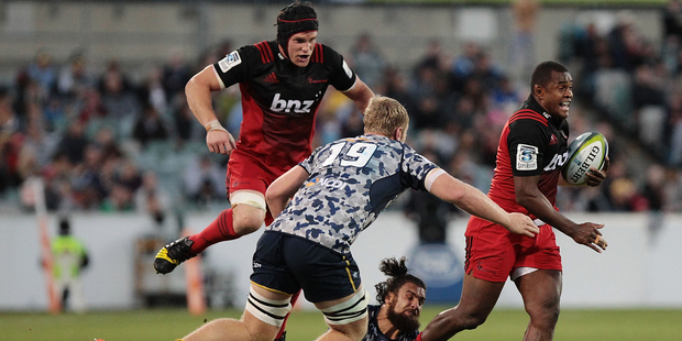 Crusaders Matt Todd (L) and Jone Macilai (R) were instrumental during their team's destruction of the Brumbies at GIO Stadium. Photo / Getty