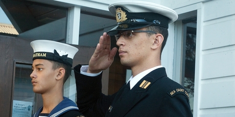 RESPECTS: Sea Cadets Hamish and Dominic Hahunga salute as the bell sounds at St George's Anglican Church for the 152th Battle of Gate Pa commemorations.