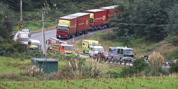 Traffic is backed up at the scene where a car, pictured on the right, has crashed on SH2 at Otamarakau. Photo/George Novak