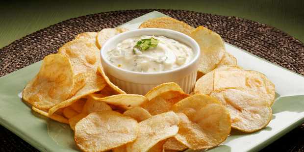 When it comes to dipping, do you reach for the carrot sticks or the chips? Photo / Getty