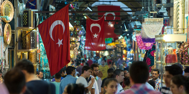 Customers browse souvenirs and other goods in the Grand Bazaar in Istanbul.