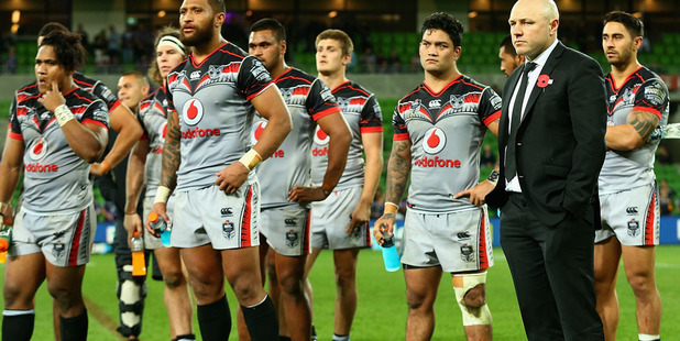 The Warriors react after their 42-0 defeat to the Storm. Photo / Getty